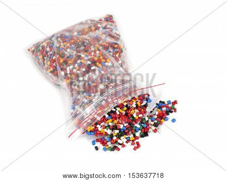 plastic polymer granules packet on white background