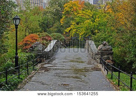 Gapstow Bridge is one of the icons of Central Park Manhattan in New York City during rain storm