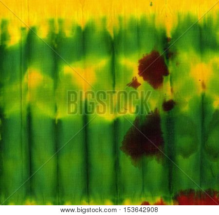 Tie dye pattern abstract background. Green and yellow.