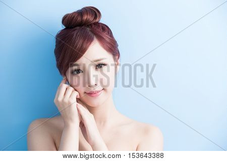 beauty woman smile to you isolated on bluebackground asian