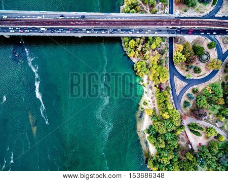 Kyiv roads with bridge across Dnipro, Ukraine, top view, aerial photo