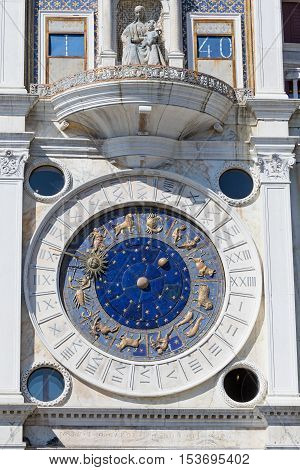 Close up view of the astronomical clock at San Marco Square in Venice (Italy). Vertically.