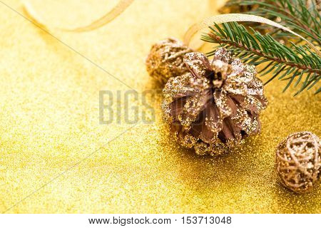 Christmas background. New year's Eve. 2017. Christmas tree, gold, cones, ornaments