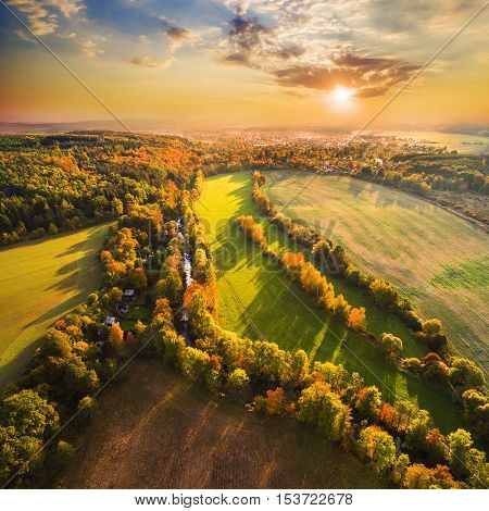 Beautiful sunset over The Radbuza river. Autumn in western Bohemia. Aerial view to scenic landscape in Czech Republic, Central Europe. HDR (warm filtered) photography. 