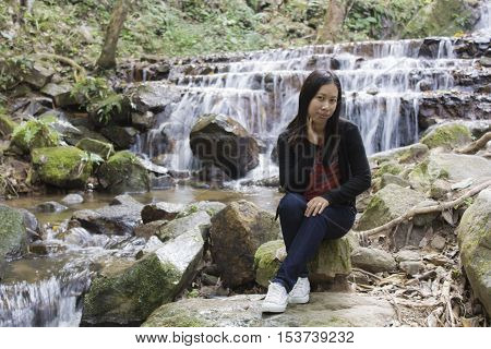 Thai woman with Mae Kam Pong waterfall Chiangmai Thailand