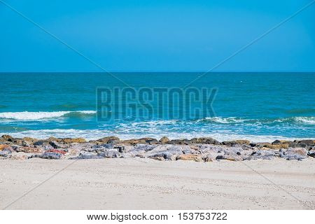 Beautiful blue sea wave and blue sky in Cha Am, Phetchaburi Province, Thailand.