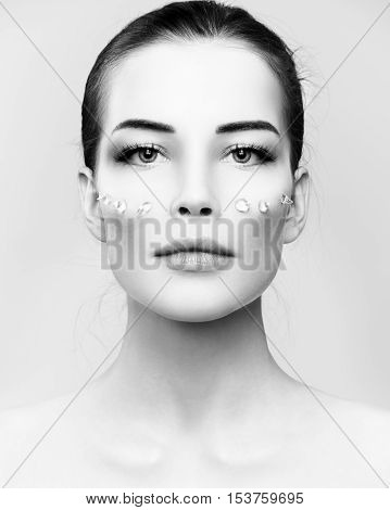Fashion Beautiful Woman With Drops Of Gel On Another Cheek