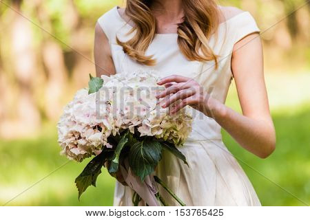 Beautiful bride with flowers