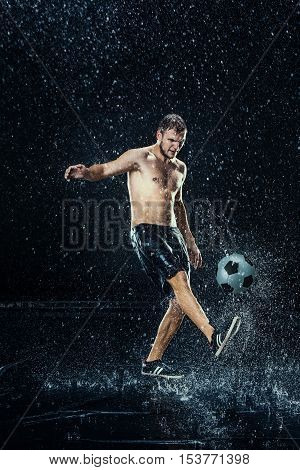 Water Drops Around Football Player