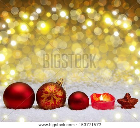 Christmas red decoration with snow isolated on bokeh background.Defocused bokeh lights.