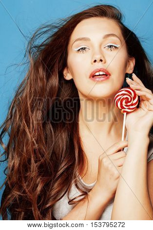 young pretty adorable woman with candy close up like doll makeup