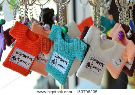 Colorful small T-shirt keychain with bell from Thailand