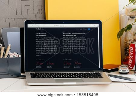 PARIS FRANCE - OCT 28 2016: Apple Computers website on new MacBook Pro Retina with OLED touch bar in a geek creative room showcasing new professional laptop - detail of the new CPU processors