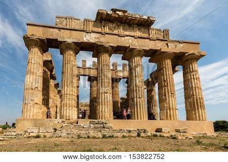 SELINUNTE ITALY - AUGUST 11 2016: Temple E (490-480 BC) in Selinunte thought to be dedicated to Hera considered to be one of the finest examples of Doric architecture in Sicily.