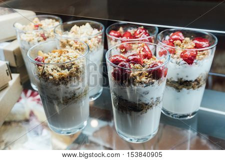 Granola With Yogurt In Glass Cups, Delicious Homemade Granola Using Glass. Fruit Granola