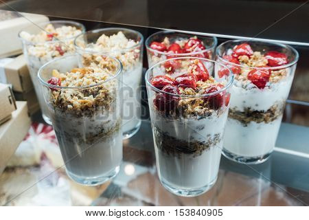 Granola With Yogurt In Glass Cups, Delicious Homemade Granola Using Glass. Fruit Granola