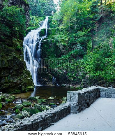 The observation deck in the base of Kamienczyk Waterfall in polish mountain.