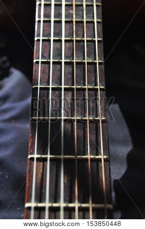 Classical guitar. Issuing a stringed instrument sounds. Fretboard strings and resonation