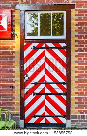 Door at traditional small and cutel house in Holland