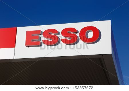 Elverum Norway - October 3 2016: Close-up of an Esso petrol service station protective roof with logo.