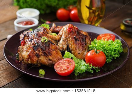 Baked Chicken Wings In The Asian Style On Plate.