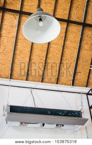 Ceiling type hanging air conditioner unit stock photo