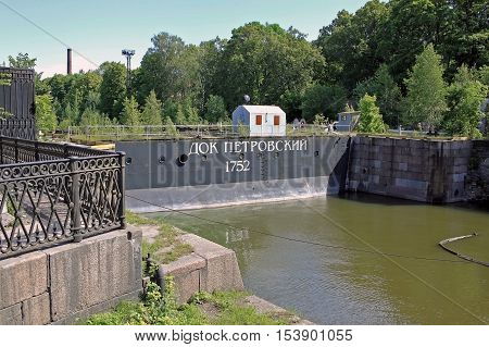 Kronstadt Russia - 10 July 2016: Gates of Petrovsky dock. Built by the project of the Emperor Peter the Great in 1752