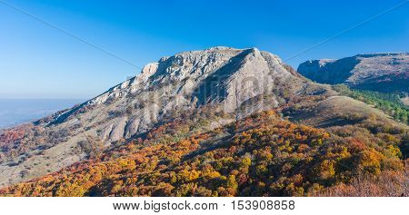 Bald Ivan mountain under morning light at autumn season - mountain pasture Demerdzhi Crimea Ukraine.