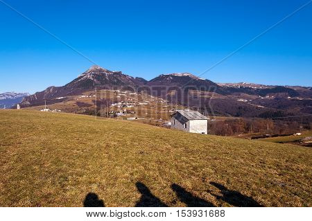 Plateau of Lessinia peak of Corno d'Aquilio and Italian Alps. Regional Natural Park of Lessinia Veneto Verona Italy