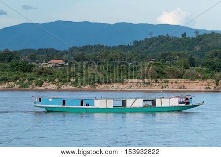 Laos transportation boat on Khong river in Golden triangleThailand.