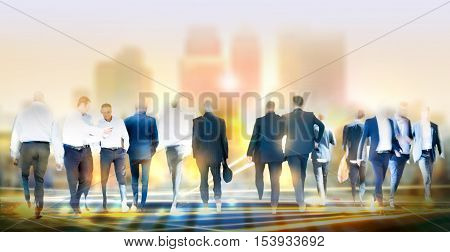 Business people walking in the City, blurred image with lights reflection. Business and modern life concept