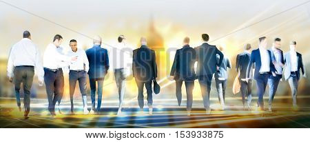 Business people walking in the City, blurred image with lights reflection. Business and modern life concept