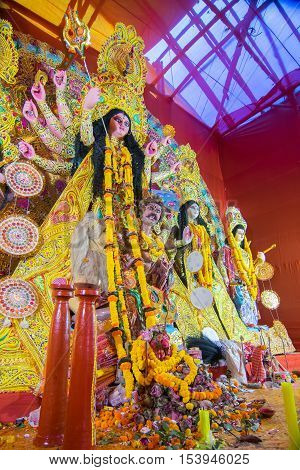 KOLKATA INDIA - OCTOBER 21 2015 : Beautiful interior of decorated Durga Puja pandal at Kolkata West Bengal India. Durga Puja is biggest religious festival of Hinduism.