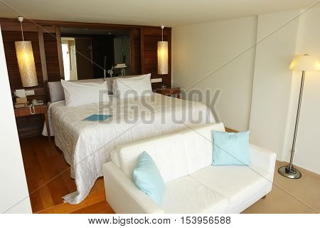 HERAKLION CRETE GREECE - MAY 13 2014: The Interior room with big bed and bath in modern building of luxury class hotel on the Mediterranean coast of Crete May 13 2014 Greece.