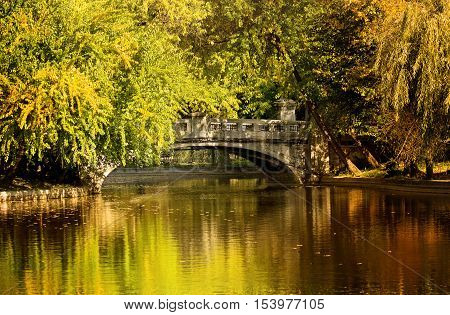 Autumn in Bucharest. Lake and bridge in Cismigiu Park.