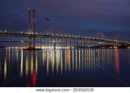 Road Bridges Over Firth Of Forth Near Queensferry In Scotland