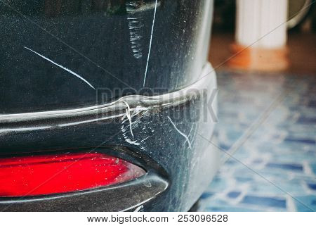 Right Rear Bumper Of Car Is Broken And Be Marked For Insurance Process