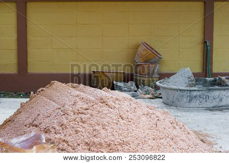 Construction Sand And Concrete Mixing Tub Is On The Floor Ready To Work On Repairing Old House