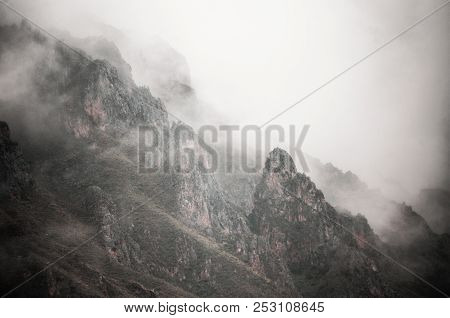 Mountains Can Be Seen From Behind The Clouds