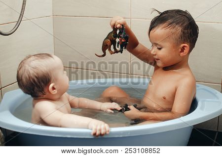 Children, Brother And Sister In The Bathroom