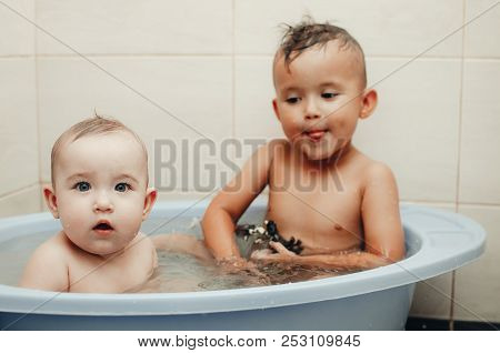 Children, Brother And Sister In The Bathroom