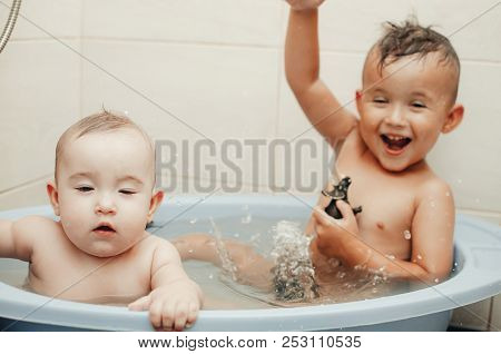 Children, Brother And Sister In The Bathroom