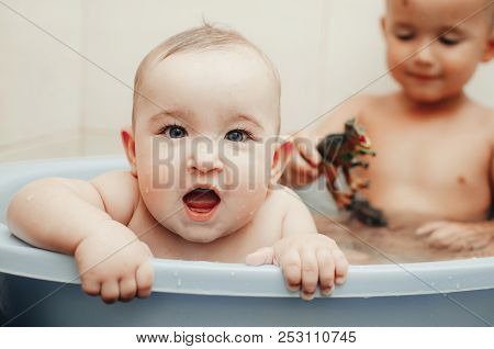 Children, Brother And Sister In The Bathroom