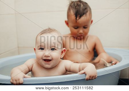 Children, Brother And Sister In The Bathroom