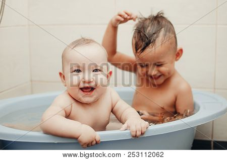 Children, Brother And Sister In The Bathroom