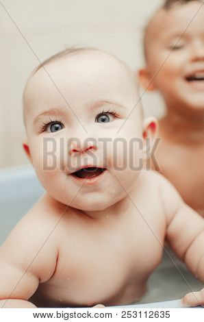 Children, Brother And Sister In The Bathroom