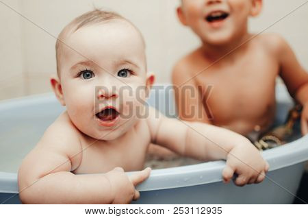Children, Brother And Sister In The Bathroom