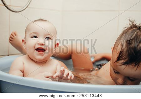 Children, Brother And Sister In The Bathroom