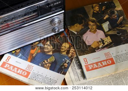 Lugansk, Ukraine - July  28, 2018: Old School Vintage Radio Vef And Retro Magazine Radio Published I