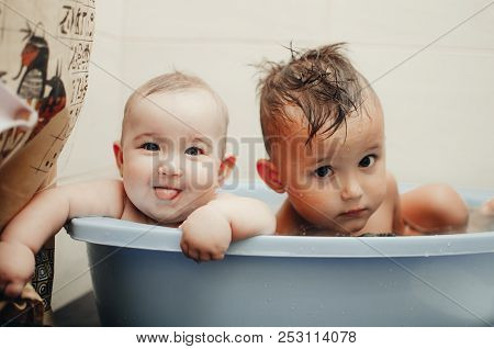 Children, Brother And Sister In The Bathroom